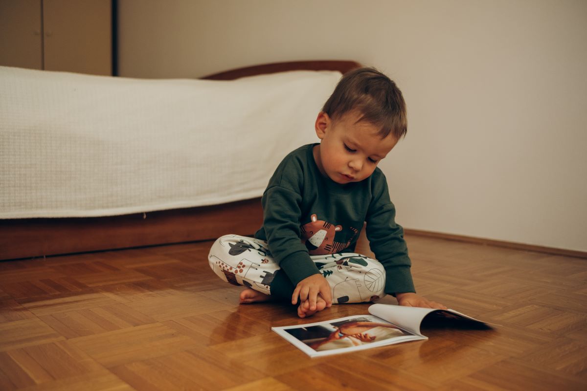 child reading book