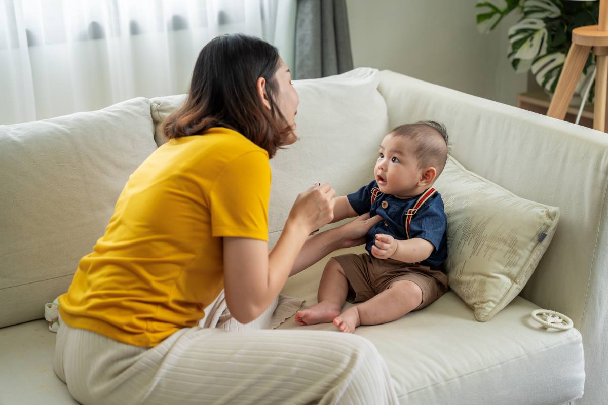 parent and baby speaking with each other