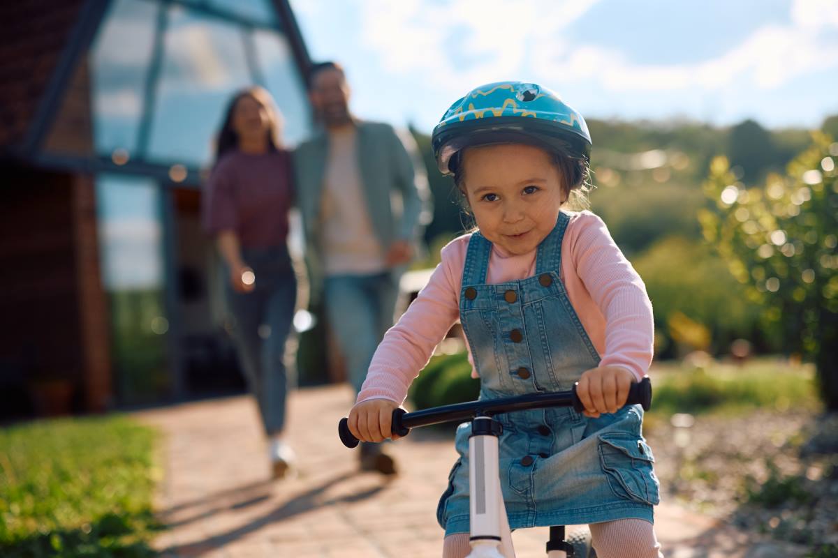 little girl riding bicycle