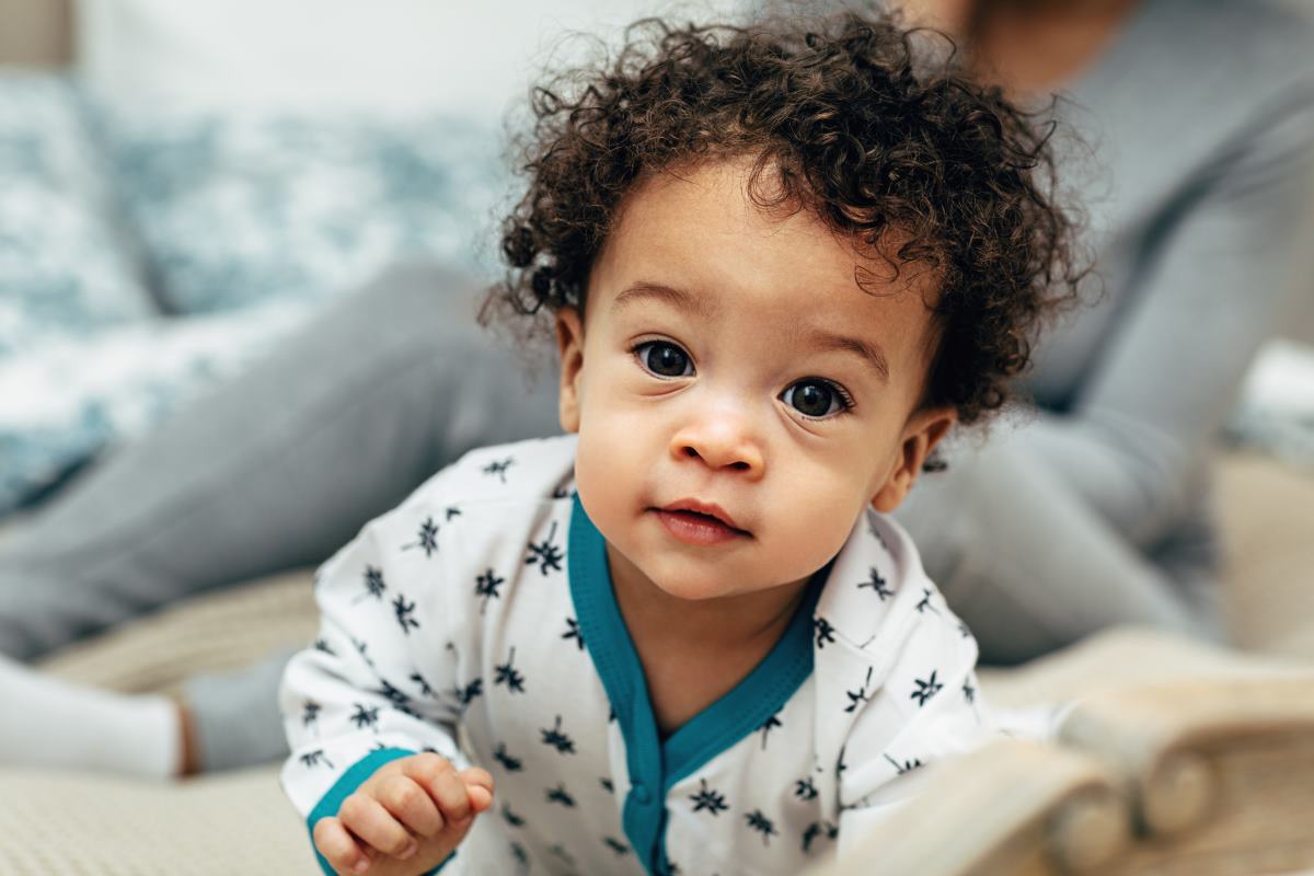 curly haired baby boy portrait