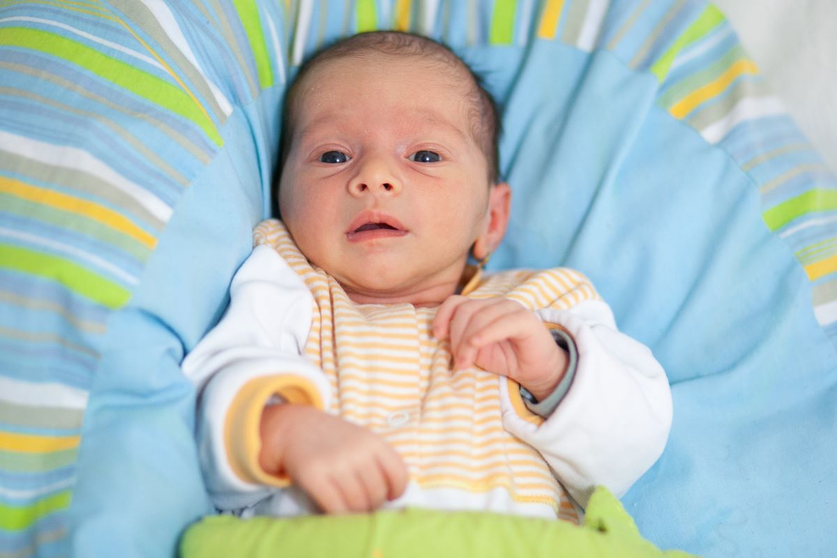 sleepy newborn boy